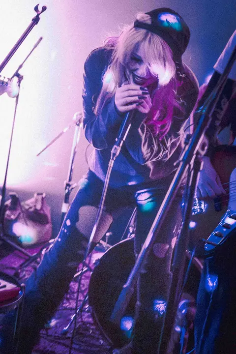 Singer performing at a local show